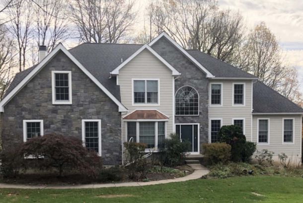 House after stucco replacement | James Hardie Siding Contractor Berwyn | Kenny Construction Group